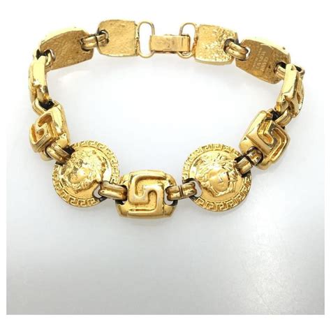 versace gold charm bracelet|gianni versace bracelet.